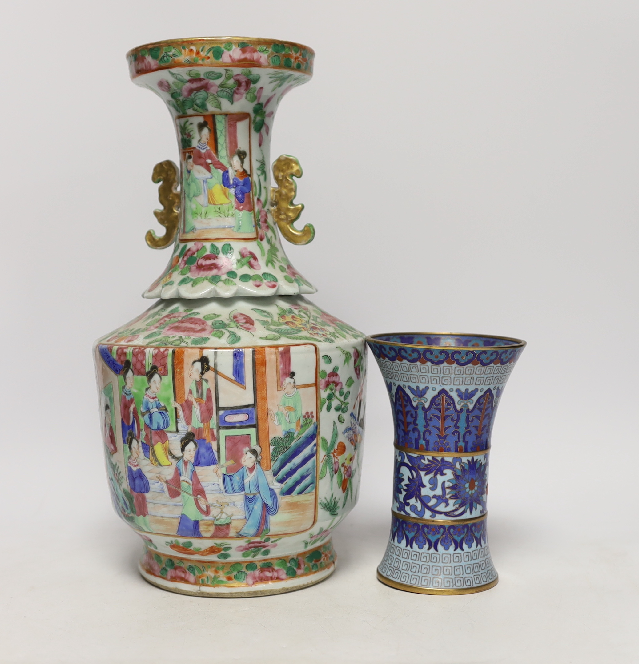 A 19th century Chinese famille rose two handled vase and a cloisonné gu beaker style vase, largest 33cm high